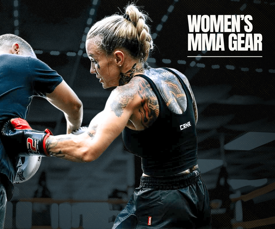 Photo of Combat Corner's Women's MMA Gear. The photo shows CRNR Pro Team Member Taylor Starling using Combat Corner C2 MMA Training Gloves, HMIT Supply Muay Thai Shorts, and Women's Active Bra Tank.