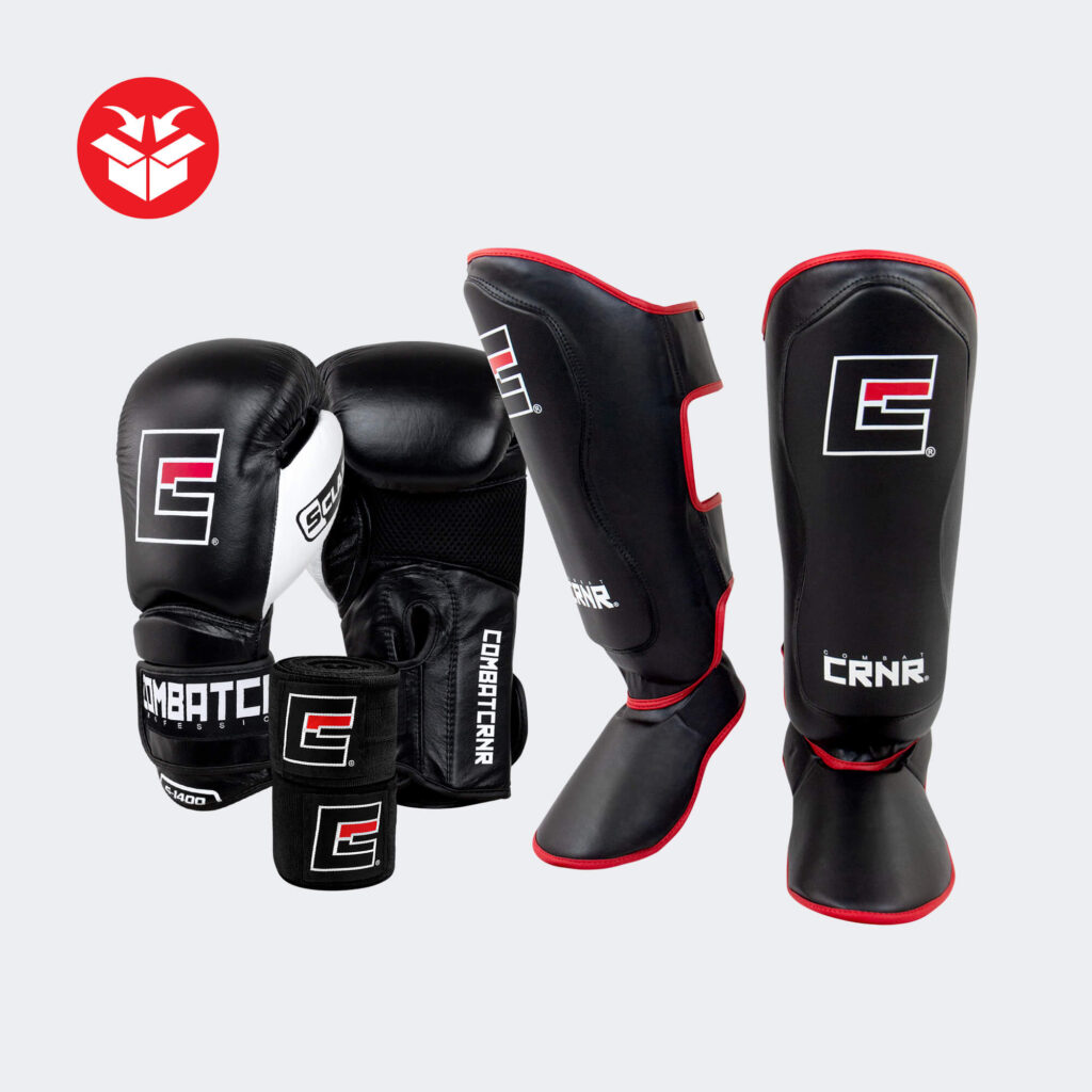 Photo of Combat Corner's Striking Bundle Enhanced which includes CRNR S-Class Boxing Gloves, Elite Spar Shin Guards, and Pro Hand Wrap.