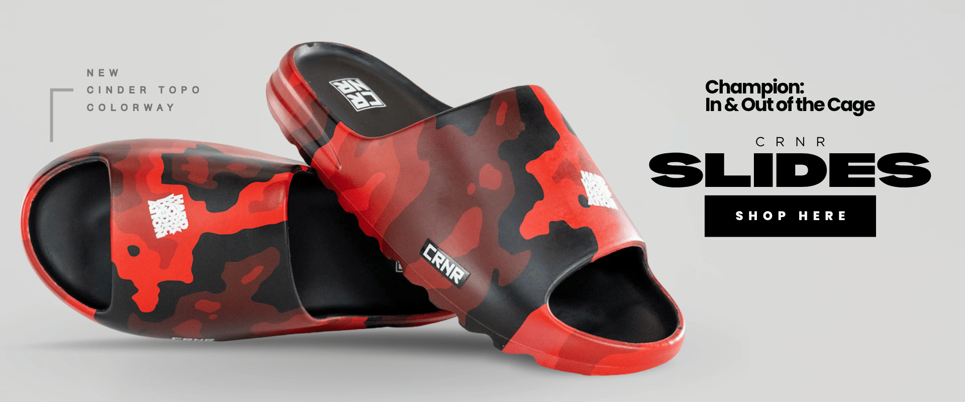 E-commerce banner displaying a pair of red and black camouflage Combat Corner Cinder Topo athletic slides against a light grey background with promotional text reading 