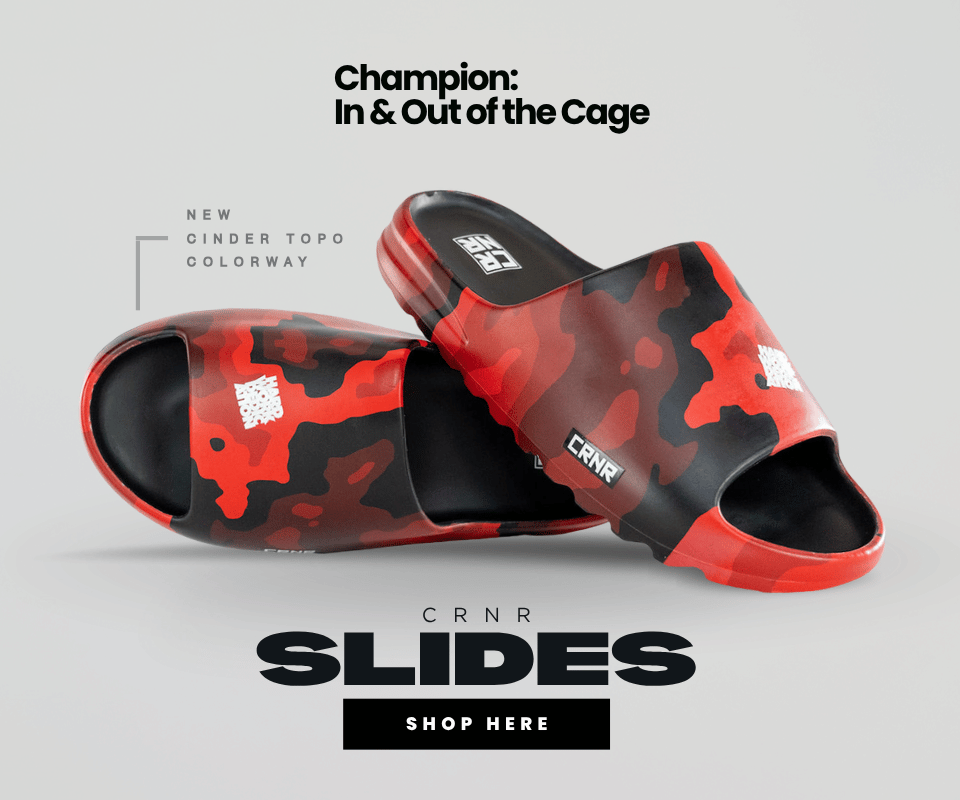 E-commerce banner displaying a pair of red and black camouflage Combat Corner Cinder Topo athletic slides against a light grey background with promotional text reading 